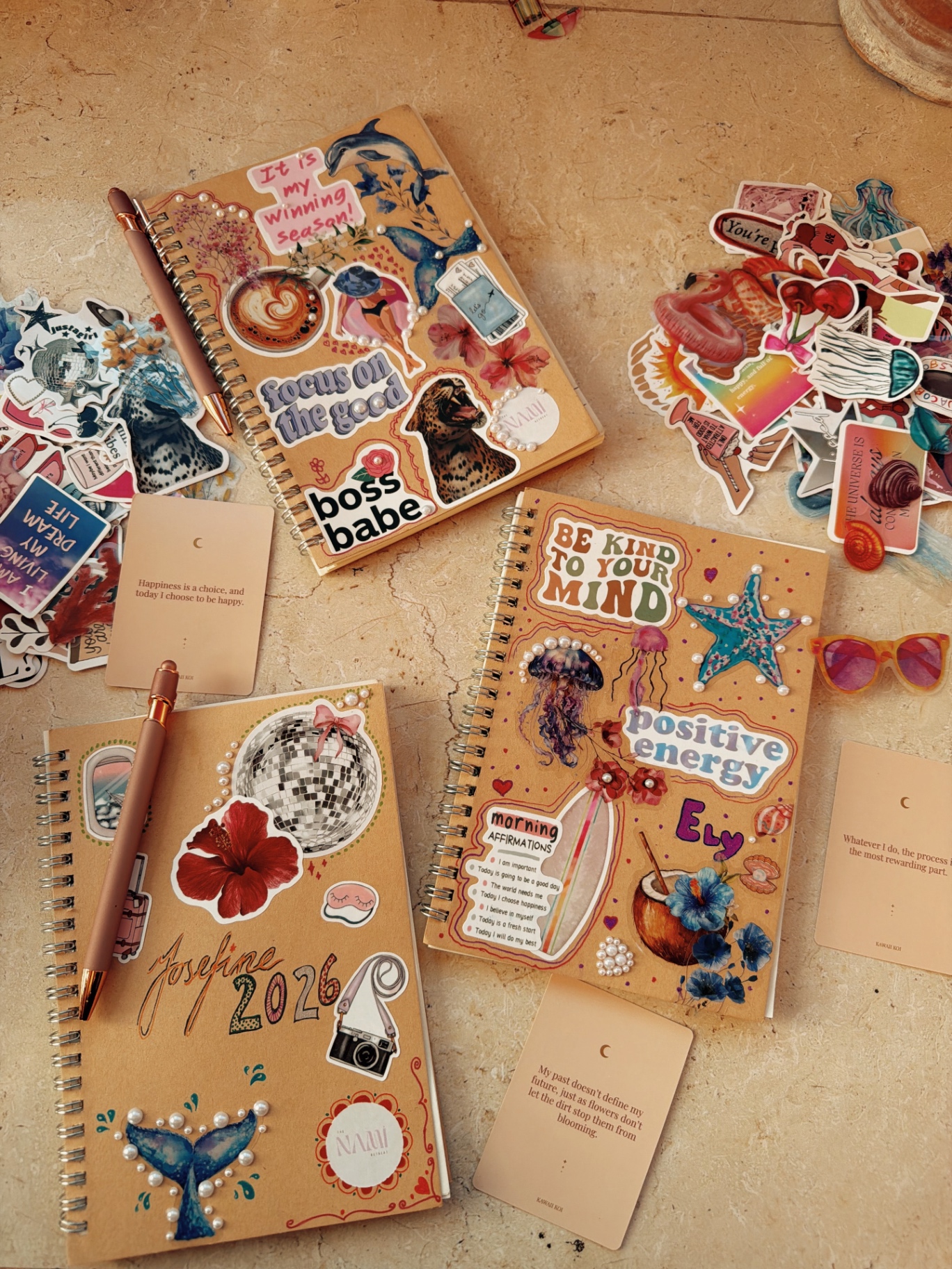 Open journal with dried flowers